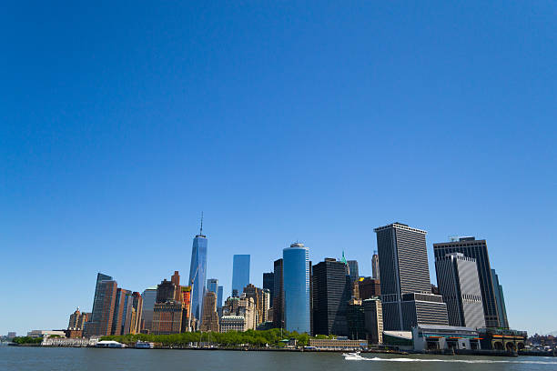 Arriving to Manhattan from the South Battery park and the Southern tip of Manhattan from a ferry to Staten Island truism stock pictures, royalty-free photos & images