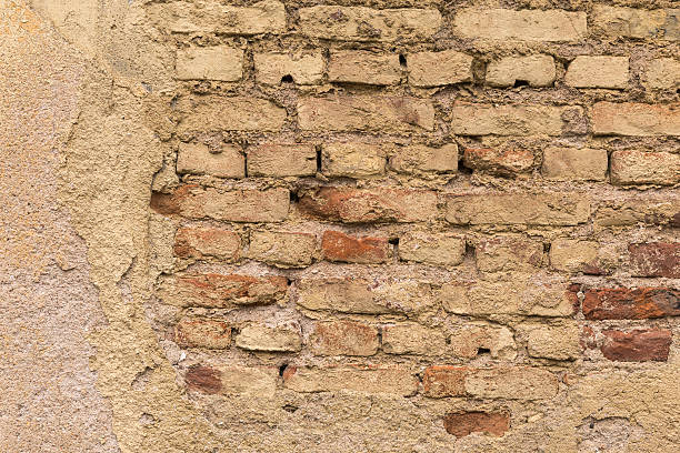 istock Closeup of damaged wall 476817522