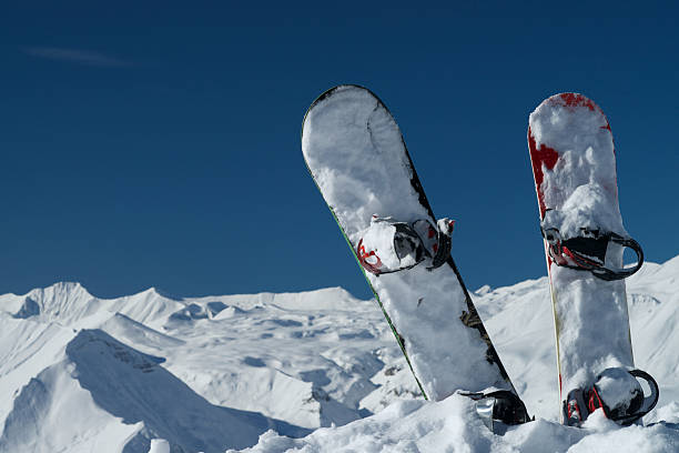 istock Snowboards in snowy mountains 476817716