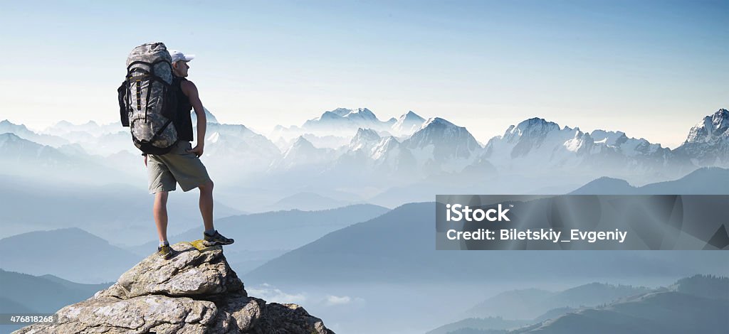 Active life concept Tourist on the peak of mountains. Sport and active life concept 2015 Stock Photo