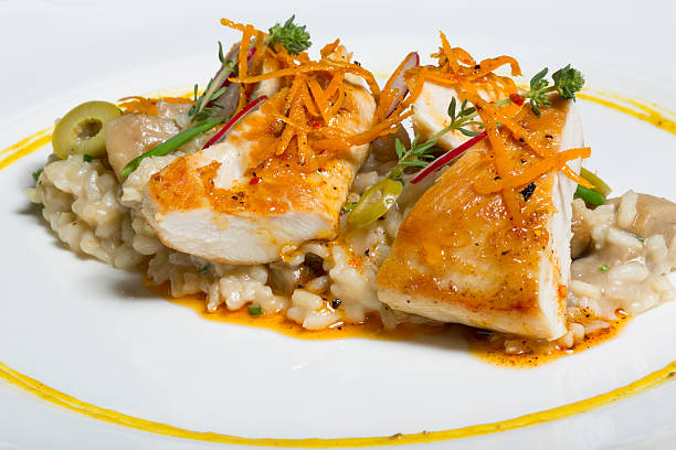 istock Marinated turkey fillets with mushroom risotto 476818740