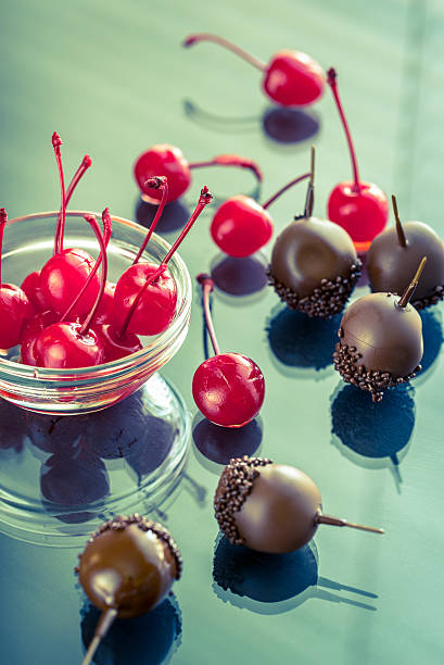 istock Chocolate and cocktail cherries on the glass 476818762