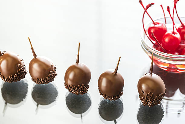 istock Chocolate and cocktail cherries on the glass 476819744