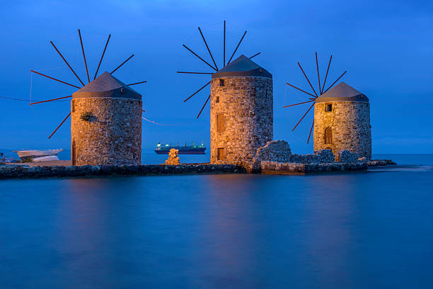 istock Ancient windmills of chios at night 476824162