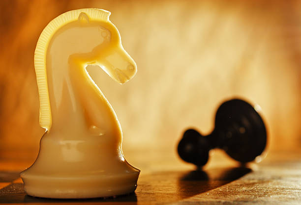 istock Chess knight pawn in front and in the background. 476824234