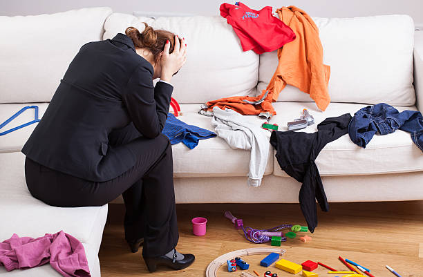 istock Unhappy woman in mess 476825025
