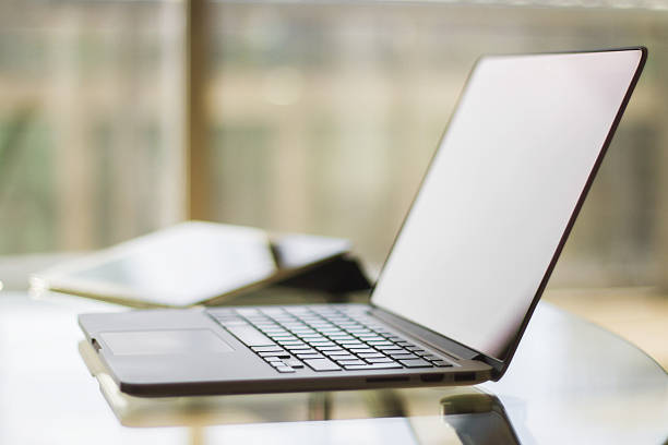 istock laptop on table at home, shallow depth of field 476825628
