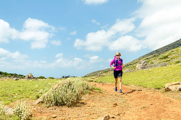 istock Trail running happy runner in beautiful mountains 476826230