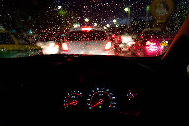 istock Abstract traffic jam  in raining day. View from car seat. 476829740