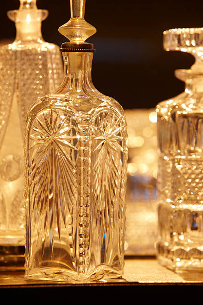 istock Empty crystal bottles for liquor in warm tone 476831226
