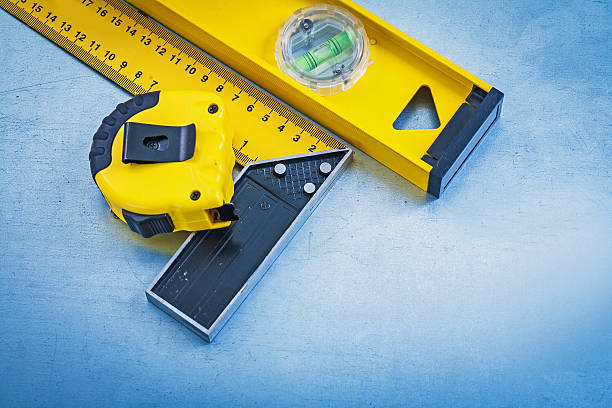 istock Yellow instruments of measurement on metallic background mainten 476831466