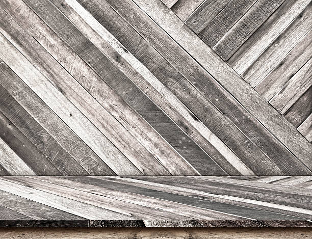 istock Empty Diagonal Wooden Table top at diagonal Wooden wall 476834090