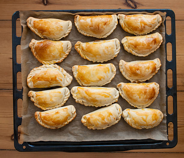 fresh empanadas - traditional food  on baking tray