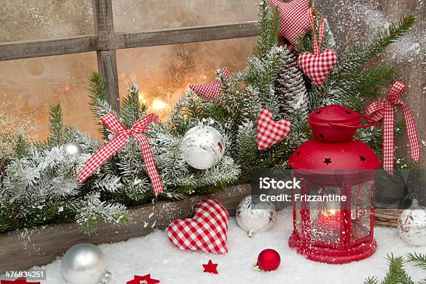 Red Rustic Christmas Decoration With A Latern And Snow Stock Photo - Download Image Now
