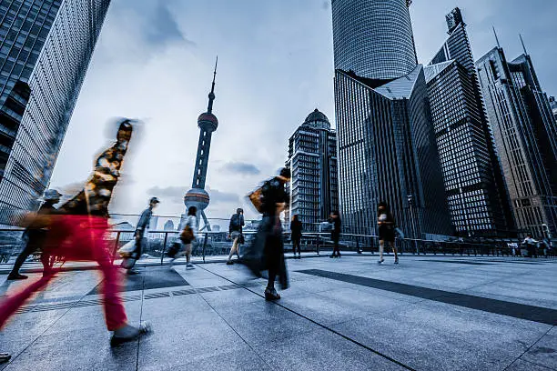 motion passengers walking on the landmark of shanghai china background.