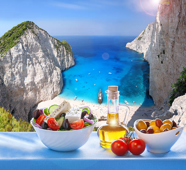 istock Navagio beach with Greek salad in Zakynthos, Greece 476835708