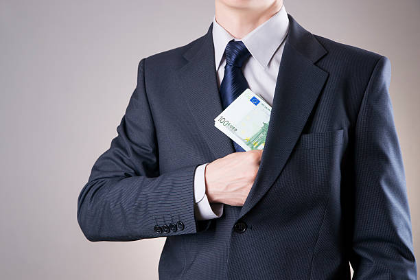 istock Businessman with money in studio 476835974