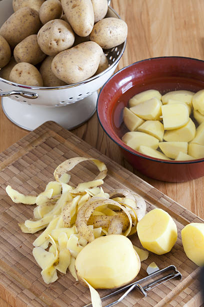 istock Potatoes are prepared for cooking 476836173