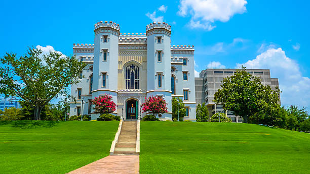 Louisiana Old State Capitol The Louisiana Old State Capitol building and front lawn in Baton Rouge, Louisiana. baton rouge stock pictures, royalty-free photos & images