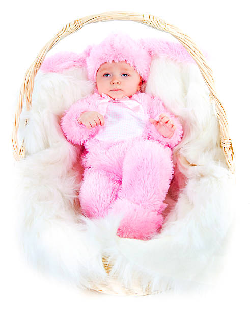 istock funny newborn baby dressed in Easter bunny  suit 476839656