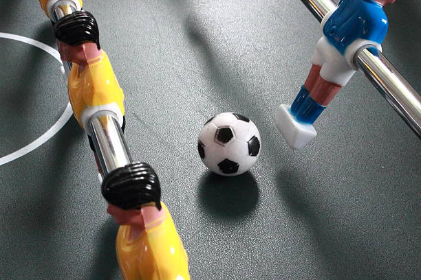 istock Football table game with ball in action 476841475