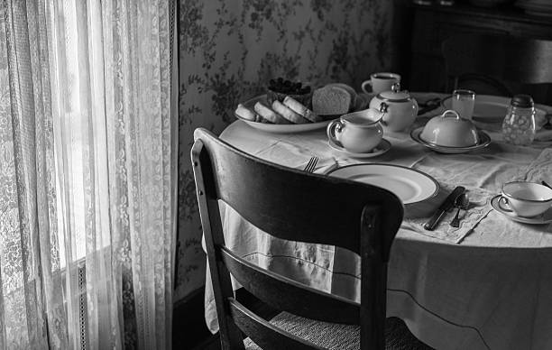 istock Antique dishes on an old table with sunlight 476841482