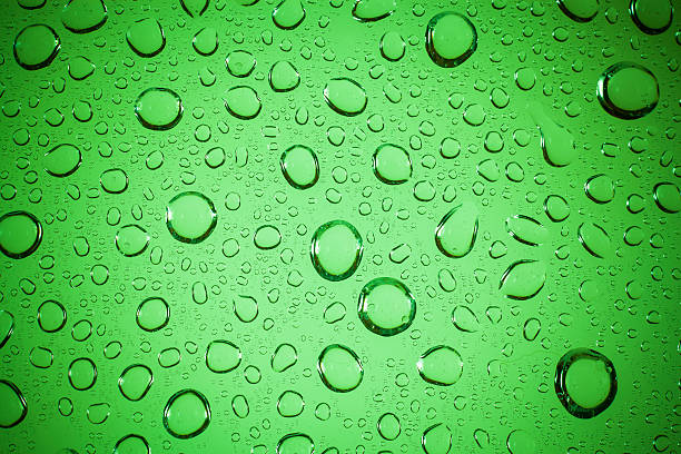 istock water drops on glass background. 476844562