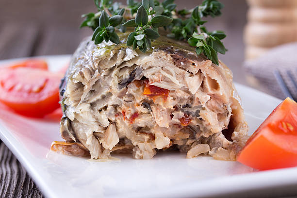 istock Mackerel fish stuffed with rice and vegetables 476851842