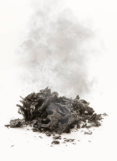 Smoldering ashes Smoking ashes on a white background ash stock pictures, royalty-free photos & images