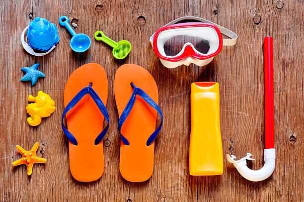 istock rustic wooden table full of summer stuff 476856914