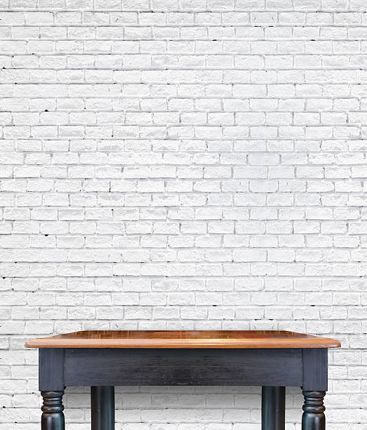 istock Empty wooden vintage table on brick tiles wall,Mock up 476857554