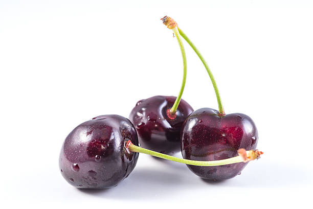 istock bunch of fresh dark red cherries isolated 476857672