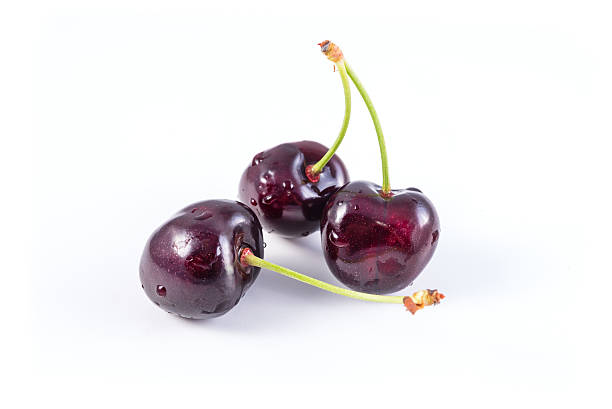 istock bunch of fresh dark red cherries isolated 476857790
