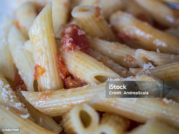 Cooked Pasta With Tomato Sauce And Grated Parmesan Cheese Stock Photo - Download Image Now