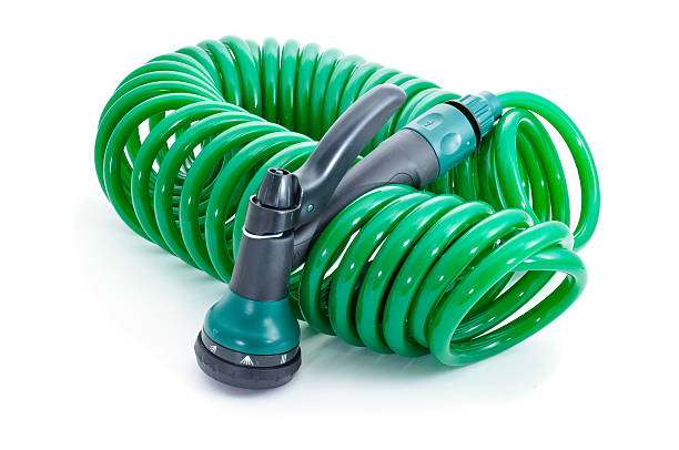 istock garden hose with sprayer pistol 476858580