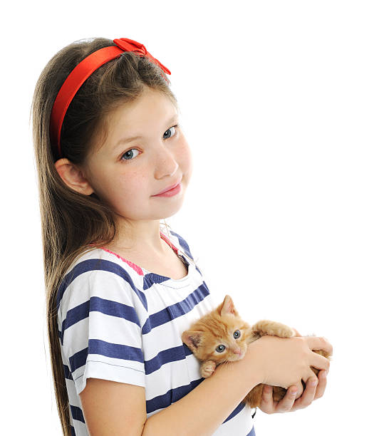 istock girl with red kitty 476859982
