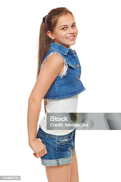 Stylish Teen Girl In A Jeans Vest And Denim Shorts Stock Photo - Download  Image Now - 2015, Adult, Beautiful People - iStock