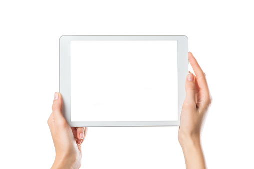 Closeup shot of woman hands holding digital tablet isolated on white background. Female hands holding a palmtop with white screen. Digital tablet with white display ready for your webpage or design.