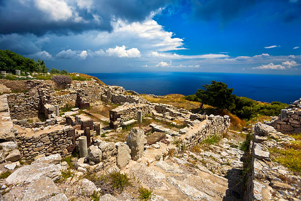 Ruins of Ancient Thera Greece. Cyclades Islands - Santorini (Thira). The excavations of Ancient Thera (Thira) on the hill Mesa Vouno - "House of Tyche" santorin stock pictures, royalty-free photos & images