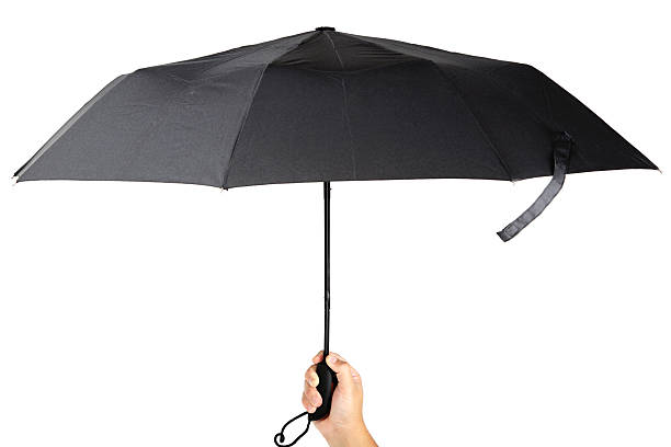 istock Modern black umbrella in handon white background. 476866426