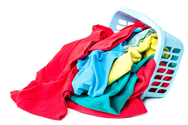 istock Clothing with a blue container for washing on white background. 476867070