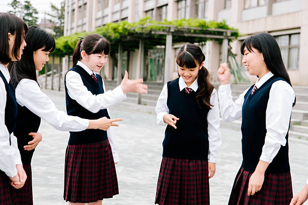 istock Japanese high school. Students exercise outside, playground games, breaktime 476871612