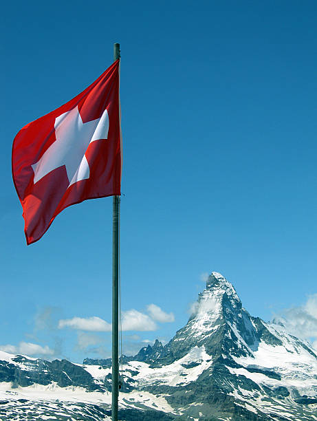 istock Matterhorn and Swiss Flag 476872500