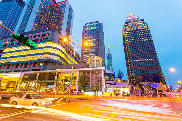 istock traffic light trails in modern street 476875432