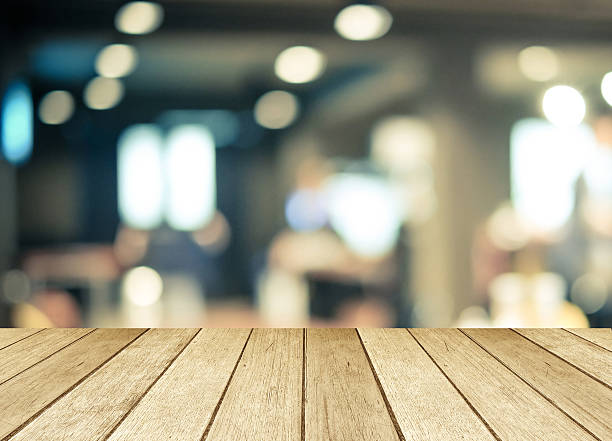 istock Perspective wood over blurred restaurant with bokeh background 476881462