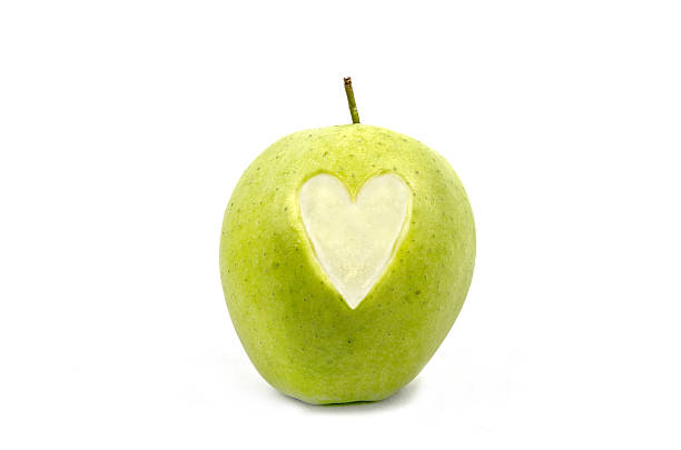 istock Lovely Heart in an Apple 476882758