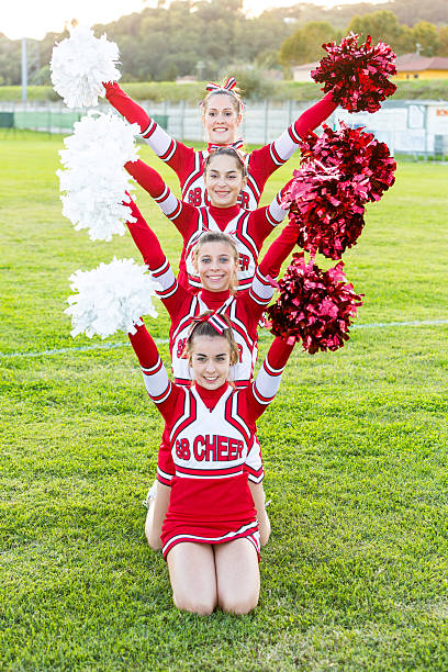 istock Group of Cheerleaders in the Field 476885485