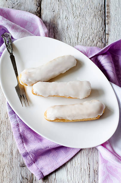 eclairs on a white plate