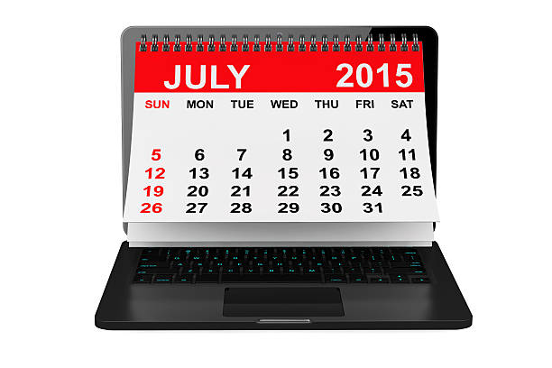 istock July 2015 calendar over laptop screen 476886594