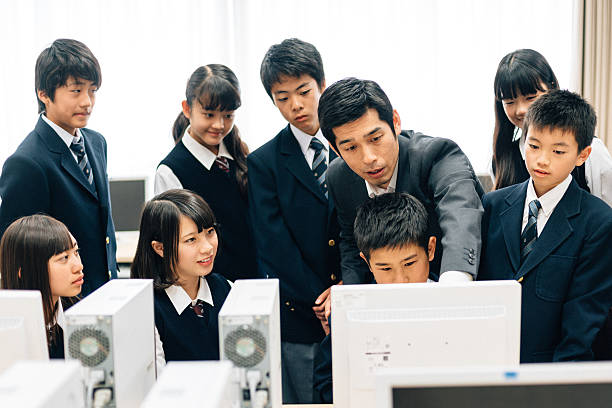 教師や学生のコンピュータラボ - japanese culture asian ethnicity friendship computer ストックフォトと画像